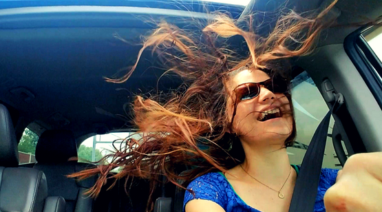 Audrey Wallace with the windows down to dry her hair