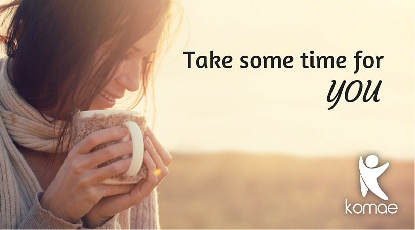 A woman enjoying the little pleasures in life. A hot cup of coffee on a quiet morning outside.